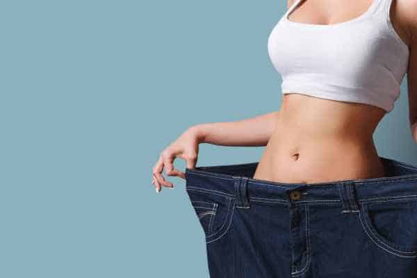 woman after fat reduction treatment Banstead
