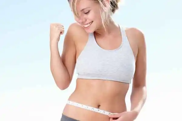 woman happy after fat reduction treatment Banstead