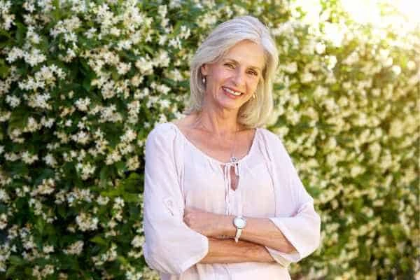 Older woman happy with urinary incontinence treatment Banstead